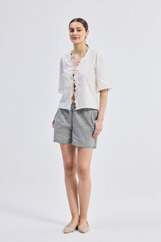 Relaxed Fit Top With Ruffles and Front-Ties in Cream