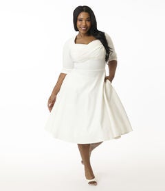Unique Vintage Plus Size 1950s Ivory Pleated Bust Swing Dress