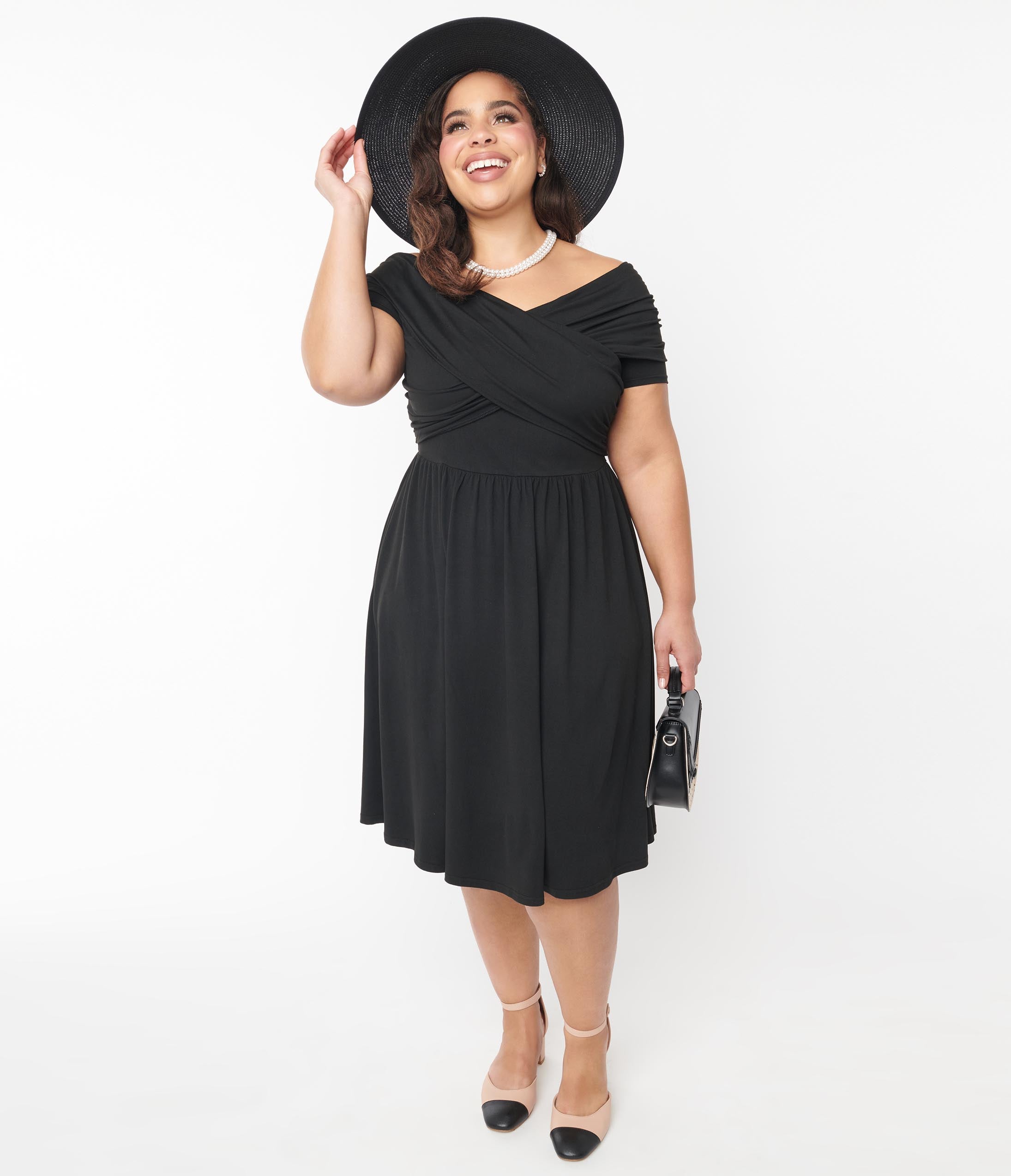 Unique Vintage Plus Size Black Shirred Swing Dress | Dia & Co Unique Vintage Plus Size Black Shirred Swing Dress | Dia & Co